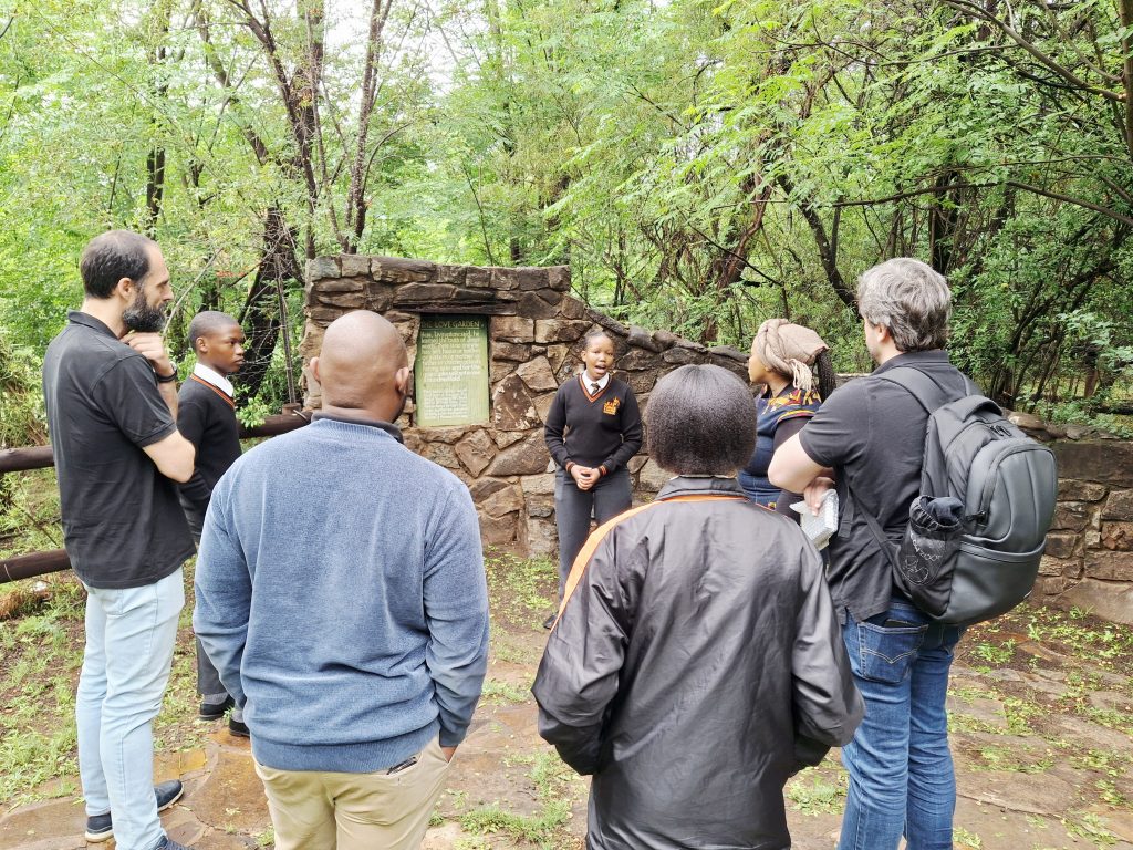 A student from the LEAP Math and Science School shares curiosities about the school’s Love Garden with the TORSA team.