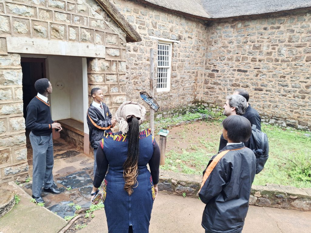 A student explains aspects of his daily life to the TORSA team.